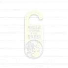 A white door hanger with a castle silhouette and the text "KNOCK FOR LADY... IF YOU DARE!" printed on it.